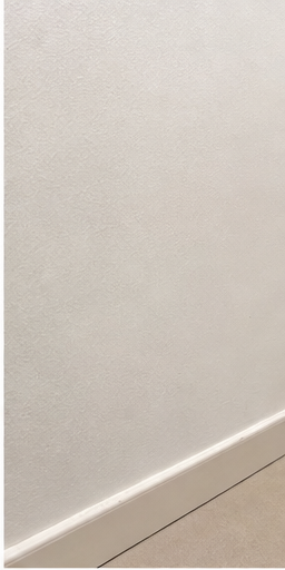 Completed wall patching and touch-up example